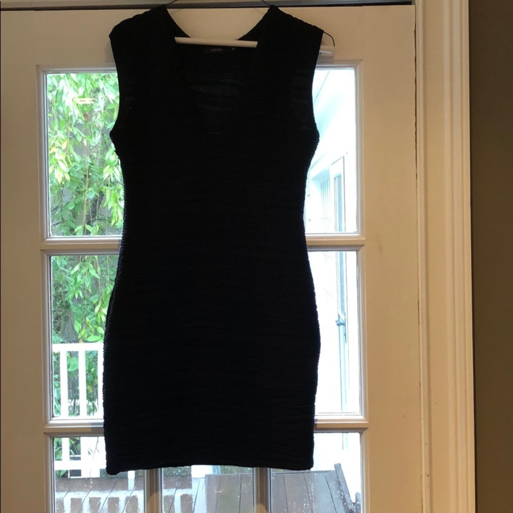 Black snug fitting LF dress ( fits like a small)